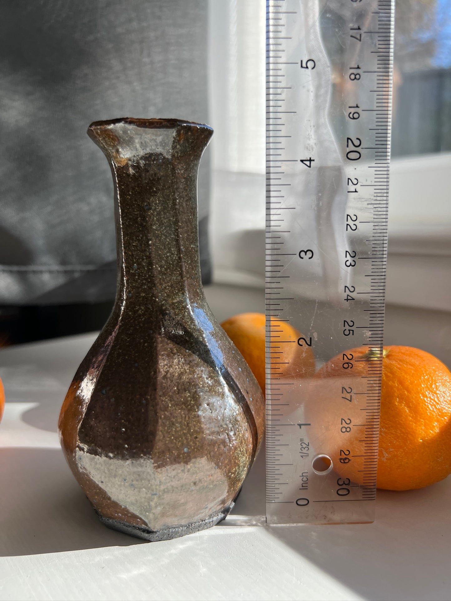 Faceted tall black mountain vase