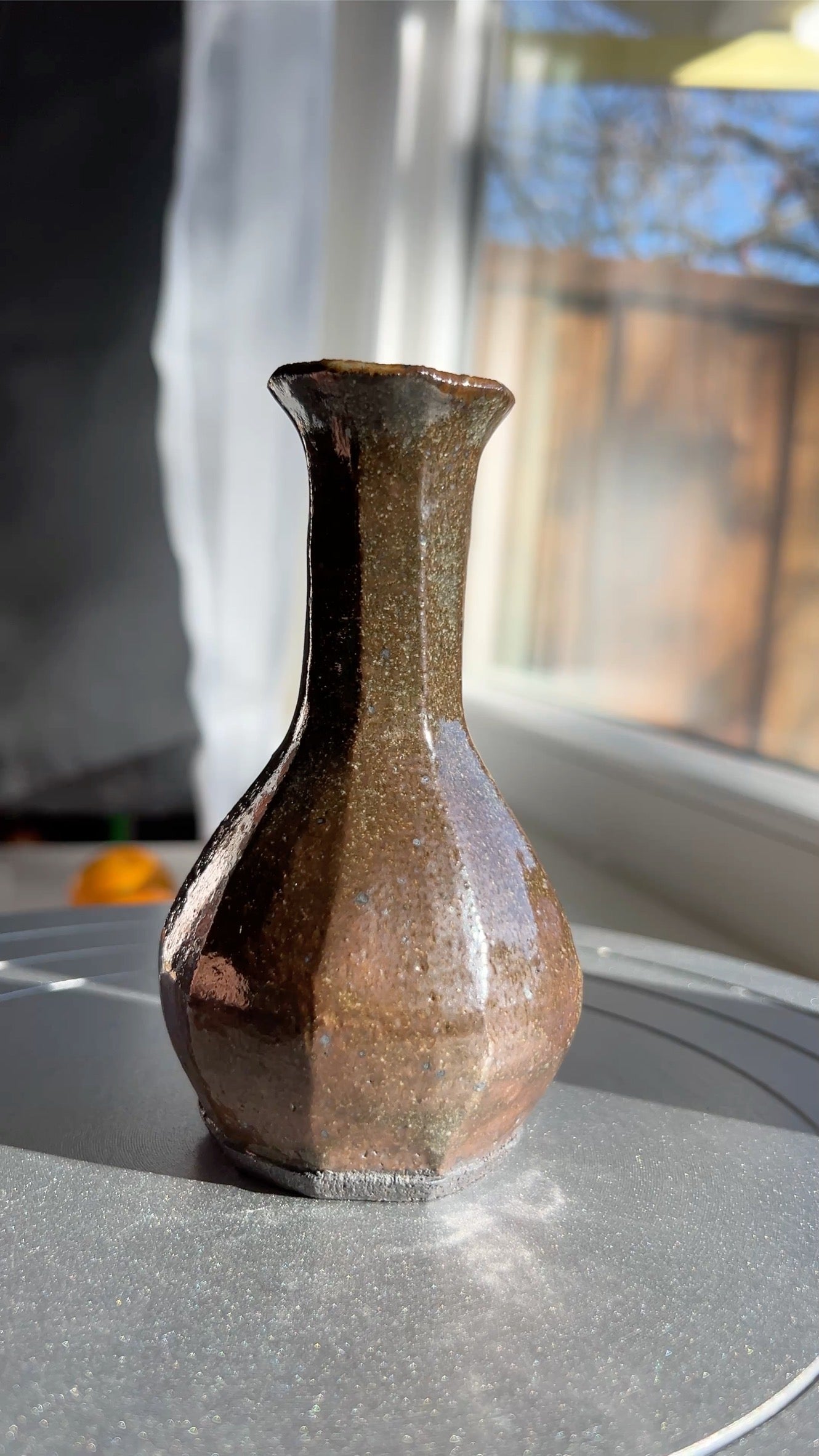 Faceted tall black mountain vase